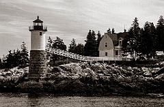 Isle au Haut Lighthouse Over Rocky Shoreline - Sepia Tone